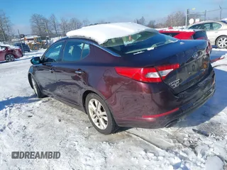 2012 Kia Optima EX with VIN 5XXGN4A61CG069907, listed as a IAAI auction lot 41275805 with 129,050 mi miles and . Bid and sale history available at carsss.com. Image 3.