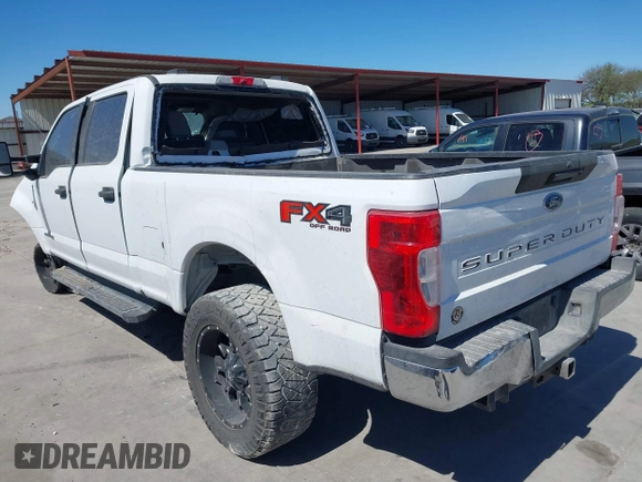 2021 Ford Super Duty F-250 SRW XL with VIN 1FT7W2BT3MEC30933, listed as a IAAI auction lot 41836915 with 100,089 mi miles. Bid and sale history available at carsss.com. Image 3.