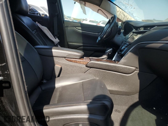 2018 Cadillac XTS Livery with VIN 2G61U5S37J9157936, listed as a Copart auction lot 74038874 with 92,661 mi miles and Salvage Title. Bid and sale history available at DreamBid. Image 7.