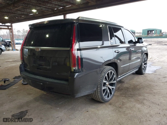 2017 Cadillac Escalade Premium Luxury with VIN 1GYS3CKJ0HR263565, listed as a IAAI auction lot 41615401 with 105,773 mi miles. Bid and sale history available at carsss.com. Image 4.