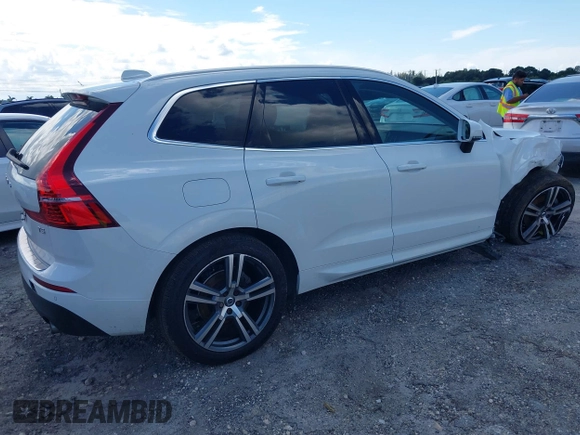 2021 Volvo XC60 Momentum with VIN YV4102DK6M1826828, listed as a IAAI auction lot 40603154 with 58,124 mi miles and . Bid and sale history available at DreamBid. Image 4.