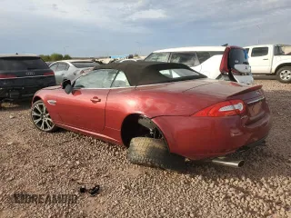 2013 Jaguar XK with VIN SAJWA4GB0DLB50530, listed as a Copart auction lot 82715724 with 24,634 mi miles and Salvage Title. Bid and sale history available at carsss.com. Image 2.