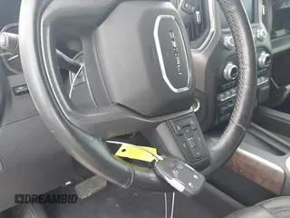 2020 GMC Sierra 1500 Denali with VIN 1GTU9FEL3LZ284219, listed as a IAAI auction lot 42283465 with 44,126 mi miles and . Bid and sale history available at DreamBid. Image 11.