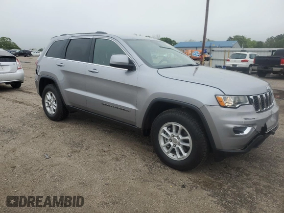 2020 Jeep Grand Cherokee Laredo E with VIN 1C4RJEAG0LC373572, listed as a Copart auction lot 52040195 with 86,604 mi miles and Salvage title. Bid and sale history available at DreamBid. Image 4.
