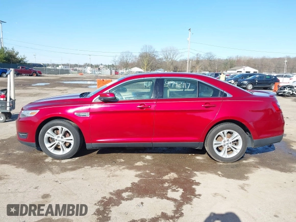 2013 Ford Taurus SEL with VIN 1FAHP2E87DG168603, listed as a IAAI auction lot 41942917 with 161,293 mi miles. Bid and sale history available at carsss.com. Image 13.