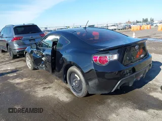 2014 Scion FR-S z VIN JF1ZNAA18E9700718, wystawiony jako IAAI lot #40958319 z przebiegiem 104 010 mil mil oraz . Historia ofert i sprzedaży dostępna na DreamBid. Obrazek 3.