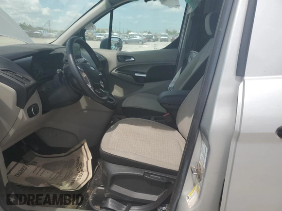 2022 Ford Transit Connect XLT with VIN NM0LS7T27N1541283, listed as a Copart auction lot 63234295 with 19,897 mi miles and Salvage title. Bid and sale history available at DreamBid. Image 7.