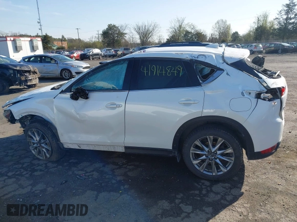 2020 Mazda CX-5 Grand Touring with VIN JM3KFBDM6L0751471, listed as a IAAI auction lot 41914849 with Not Provided miles and . Bid and sale history available at carsss.com. Image 14.