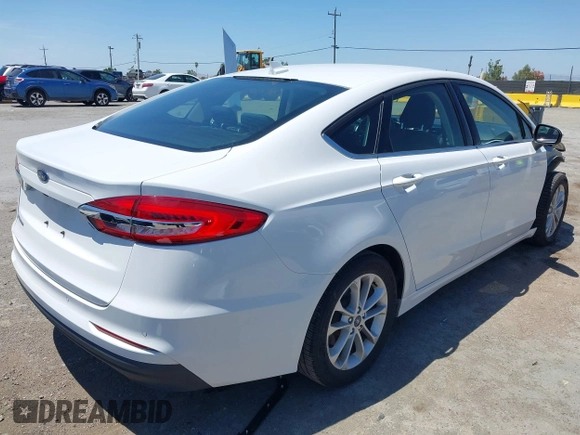2020 Ford Fusion SE with VIN 3FA6P0H73LR131988, listed as a IAAI auction lot 42468239 with 104,832 mi miles and . Bid and sale history available at DreamBid. Image 4.