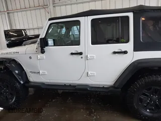 2016 Jeep Wrangler Unlimited Rubicon with VIN 1C4HJWFG4GL127379, listed as a IAAI auction lot 41732688 with 110,193 mi miles. Bid and sale history available at carsss.com. Image 14.