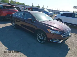 2017 Ford Fusion SE z VIN 3FA6P0H70HR198507, wystawiony jako IAAI lot #42033338 z przebiegiem 94 363 mil mil oraz . Historia ofert i sprzedaży dostępna na DreamBid. Obrazek 1.