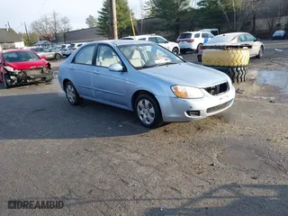 2008 Kia Spectra EX with VIN KNAFE121885514603, listed as a IAAI auction lot 40958927 with 155,539 mi miles. Bid and sale history available at carsss.com. Image 1.