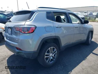 2018 Jeep Compass Latitude with VIN 3C4NJCBBXJT102753, listed as a IAAI auction lot 42379577 with 98,423 mi miles and . Bid and sale history available at DreamBid. Image 4.