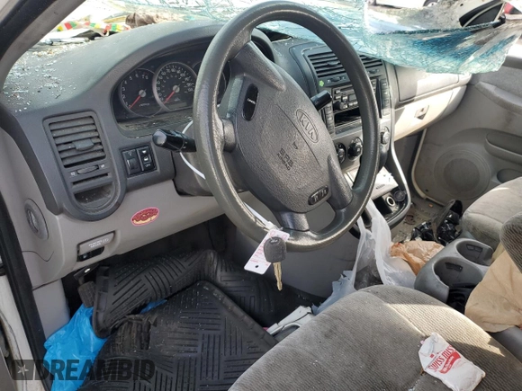 2005 Kia Sedona LX with VIN KNDUP132656684850, listed as a Copart auction lot 80095484 with 182,199 mi miles and Non Repairable. Bid and sale history available at carsss.com. Image 8.