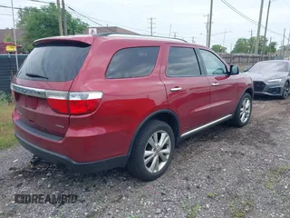 2013 Dodge Durango Crew with VIN 1C4RDJDGXDC614275, listed as a IAAI auction lot 42595022 with 171,260 mi miles and . Bid and sale history available at DreamBid. Image 4.