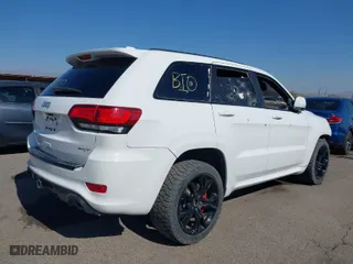 2015 Jeep Grand Cherokee SRT with VIN 1C4RJFDJ4FC122071, listed as a IAAI auction lot 41455849 with 251,476 mi miles. Bid and sale history available at carsss.com. Image 4.