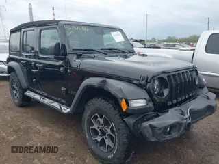 2021 Jeep Wrangler Unlimited Sport S z VIN 1C4HJXDG0MW788779, wystawiony jako IAAI lot #42137430 z przebiegiem 52 903 mil mil oraz . Historia ofert i sprzedaży dostępna na DreamBid. Obrazek 6.