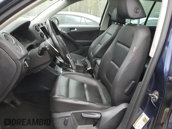 2011 Volkswagen Tiguan SE with VIN WVGBV7AX8BW523969, listed as a Copart auction lot 52463575 with 142,209 mi miles and Clean Title. Bid and sale history available at DreamBid. Image 7.