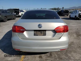 2011 Volkswagen Jetta SE with VIN 3VWDZ7AJXBM326103, listed as a Copart auction lot 57885185 with 149,064 mi miles and Salvage title. Bid and sale history available at DreamBid. Image 6.