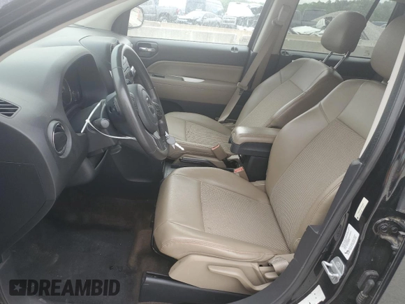 2014 Jeep Compass Latitude with VIN 1C4NJDEB4ED694292, listed as a Copart auction lot 53551255 with 139,770 mi miles and Clean Title. Bid and sale history available at carsss.com. Image 7.