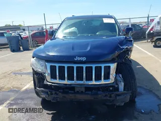 2012 Jeep Grand Cherokee Laredo with VIN 1C4RJFAG0CC160255, listed as a IAAI auction lot 41967809 with 127,702 mi miles. Bid and sale history available at carsss.com. Image 13.
