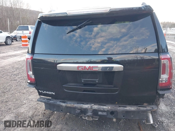2016 GMC Yukon Denali with VIN 1GKS2CKJ2GR412201, listed as a IAAI auction lot 41185716 with 124,421 mi miles. Bid and sale history available at carsss.com. Image 16.