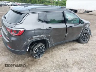 2020 Jeep Compass Trailhawk with VIN 3C4NJDDB3LT200268, listed as a IAAI auction lot 42250192 with 73,804 mi miles and . Bid and sale history available at DreamBid. Image 4.