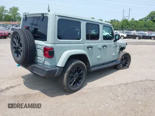 2023 Jeep Wrangler Sahara with VIN 1C4JJXP6XPW554741, listed as a IAAI auction lot 42380681 with 15,148 mi miles and . Bid and sale history available at DreamBid. Image 4.