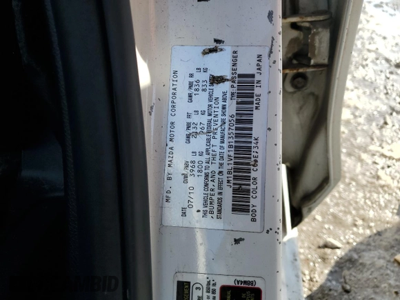 2011 Mazda 3 i Touring with VIN JM1BL1VF1B1357056, listed as a Copart auction lot 87734455 with 142,103 mi miles and Salvage Title. Bid and sale history available at carsss.com. Image 12.