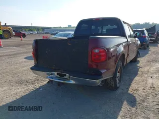 2003 Ford F-150 XLT with VIN 1FTRW07623KB56436, listed as a IAAI auction lot 42563493 with Not provided miles and . Bid and sale history available at DreamBid. Image 4.