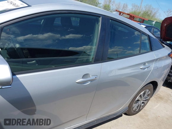 2021 Toyota Prius LE z VIN JTDL9MFU3M3028805, wystawiony jako IAAI lot #42043610 z przebiegiem 26 436 mil mil oraz . Historia ofert i sprzedaży dostępna na DreamBid. Obrazek 14.