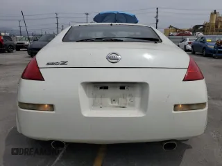 2004 Nissan 350Z Touring with VIN JN1AZ34D74T160909, listed as a Copart auction lot 58302075 with 54,100 mi miles and Salvage title. Bid and sale history available at DreamBid. Image 6.