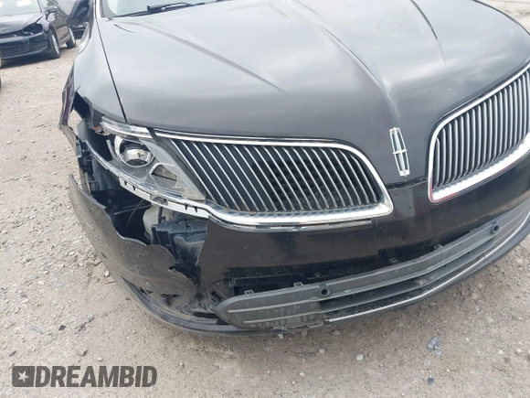 2013 Lincoln MKS z VIN 1LNHL9EK0DG600129, wystawiony jako IAAI lot #42314913 z przebiegiem 119 674 mil mil oraz . Historia ofert i sprzedaży dostępna na DreamBid. Obrazek 6.