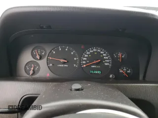2000 Jeep Grand Cherokee Laredo z VIN 1J4GW48S8YC335926, wystawiony jako Copart lot #80693454 z przebiegiem 353 635 mil mil oraz Nie do naprawy • Non repairable. Historia ofert i sprzedaży dostępna na DreamBid. Obrazek 9.