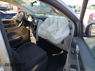 2010 Dodge Grand Caravan SXT with VIN 2D4RN5D17AR154594, listed as a IAAI auction lot 41751767 with Not Provided miles and . Bid and sale history available at DreamBid. Image 5.