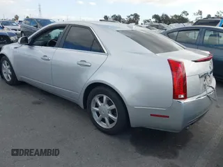 2009 Cadillac CTS RWD w/1SA with VIN 1G6DJ577690159748, listed as a IAAI auction lot 41544651 with 100,931 mi miles. Bid and sale history available at carsss.com. Image 3.