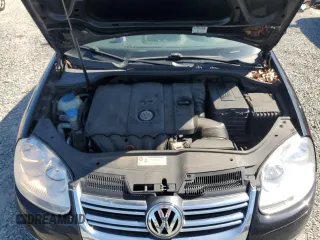 2010 Volkswagen Jetta S with VIN 3VWJZ7AJ1AM032185, listed as a Copart auction lot 58562615 with 189,752 mi miles and Salvage title. Bid and sale history available at DreamBid. Image 11.