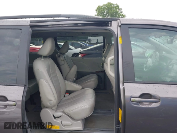2014 Toyota Sienna XLE with VIN 5TDYK3DC0ES496716, listed as a IAAI auction lot 42494549 with 158,645 mi miles and . Bid and sale history available at DreamBid. Image 8.
