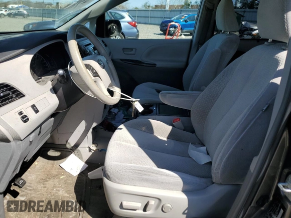 2014 Toyota Sienna LE AAS with VIN 5TDKK3DC6ES511466, listed as a Copart auction lot 52517555 with 142,744 mi miles and Salvage Title. Bid and sale history available at DreamBid. Image 7.