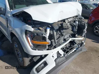2024 Ford F-150 STX with VIN 1FTEW2KP7RFA29709, listed as a IAAI auction lot 41311395 with 5,883 mi miles and . Bid and sale history available at carsss.com. Image 6.