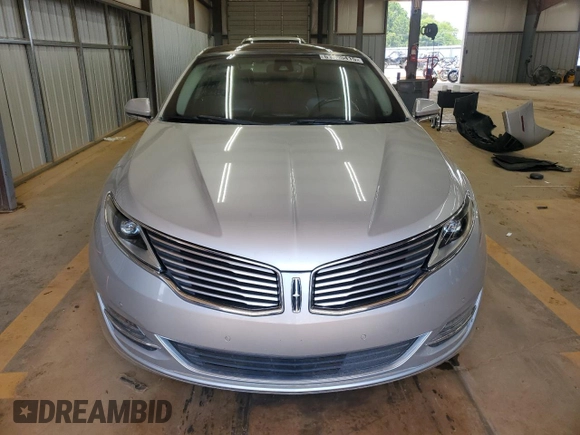 2015 Lincoln MKZ Hybrid z VIN 3LN6L2LU1FR606066, wystawiony jako Copart lot #61955415 z przebiegiem 127 214 mil mil oraz Szkoda całkowita • Salvage title. Historia ofert i sprzedaży dostępna na DreamBid. Obrazek 5.