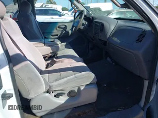 2002 Ford F-150 XL with VIN 1FTRX17WX2NA92467, listed as a IAAI auction lot 41977334 with 176,902 mi miles. Bid and sale history available at carsss.com. Image 5.