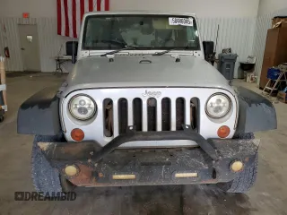 2009 Jeep Wrangler Unlimited X with VIN 1J4GZ39159L711944, listed as a Copart auction lot 50406045 with 211,099 mi miles and Clean Title. Bid and sale history available at carsss.com. Image 5.