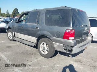 2003 Ford Expedition XLT Value with VIN 1FMPU16W43LA84570, listed as a IAAI auction lot 40937219 with 161,893 mi miles. Bid and sale history available at carsss.com. Image 3.