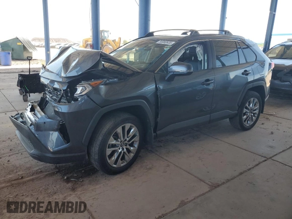 2021 Toyota RAV4 XLE Premium with VIN 2T3C1RFV4MC092721, listed as a Copart auction lot 56980835 with 31,640 mi miles and Salvage title. Bid and sale history available at DreamBid. Image 1.