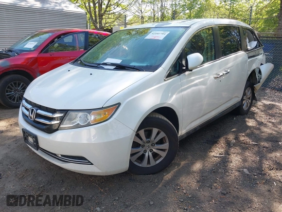 2014 Honda Odyssey EX-L with VIN 5FNRL5H63EB064854, listed as a IAAI auction lot 42102704 with 148,536 mi miles and . Bid and sale history available at carsss.com. Image 2.