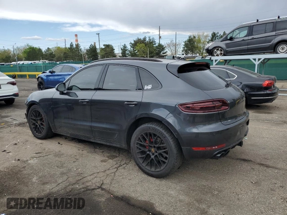 2018 Porsche Macan GTS with VIN WP1AG2A55JLB65384, listed as a Copart auction lot 54848385 with 90,938 mi miles and Salvage Title. Bid and sale history available at DreamBid. Image 2.