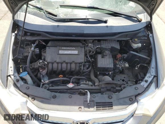 2012 Honda Insight with VIN JHMZE2H30CS003488, listed as a Copart auction lot 59016385 with Not provided miles and Salvage title. Bid and sale history available at DreamBid. Image 11.