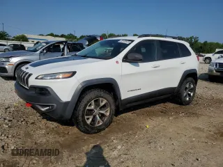 2016 Jeep Cherokee Trailhawk z VIN 1C4PJMBS4GW122031, wystawiony jako Copart lot #58733835 z przebiegiem 170 459 mil mil oraz Nie do naprawy • Non repairable. Historia ofert i sprzedaży dostępna na DreamBid. Obrazek 1.