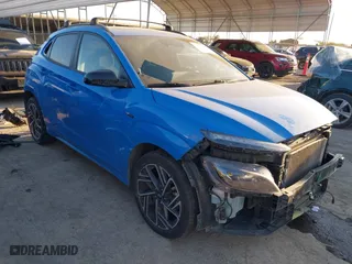 2022 Hyundai Kona N Line with VIN KM8K33A32NU867423, listed as a IAAI auction lot 41153780 with 51,727 mi miles. Bid and sale history available at carsss.com. Image 1.